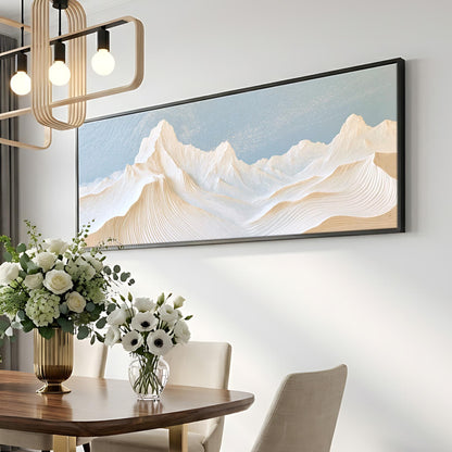 a dining room with a wooden table, a vase of white flowers, and a large framed landscape painting hanging on the wall above the table.