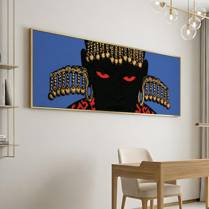 a large, colorful painting of a black figure with gold accents, displayed on a wall above a wooden desk and chair.
