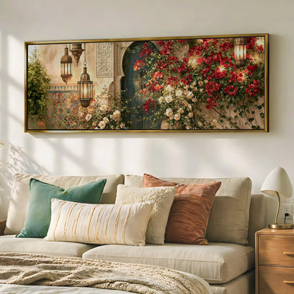 a large, ornate painting of a floral scene hanging on a wall above a beige sofa with decorative pillows.