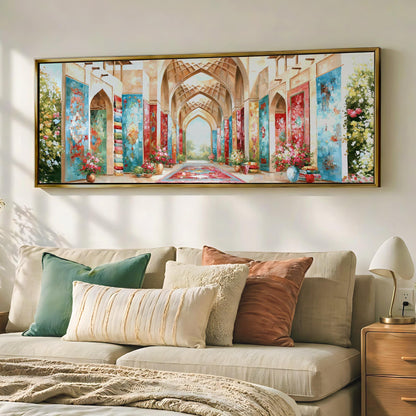 a large, colorful painting of an ornate hallway or corridor, hanging on a wall above a beige sofa with decorative pillows.