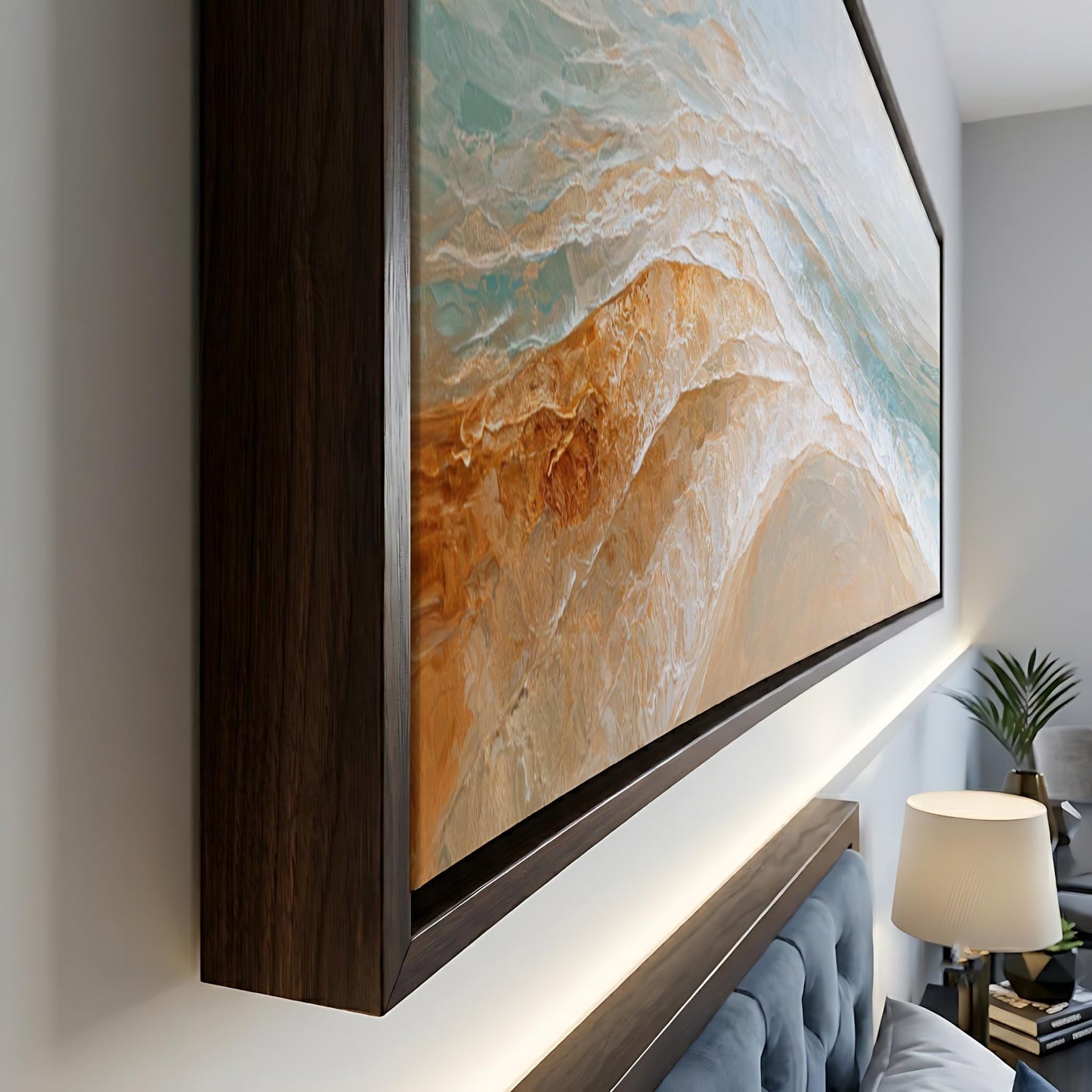 a large, framed painting of a beach scene with a wooden frame.