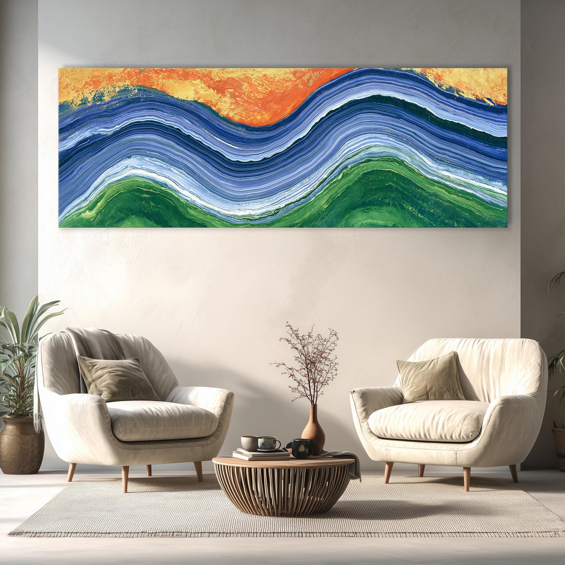 a modern living room with a large abstract painting hanging on the wall above two white armchairs and a coffee table.