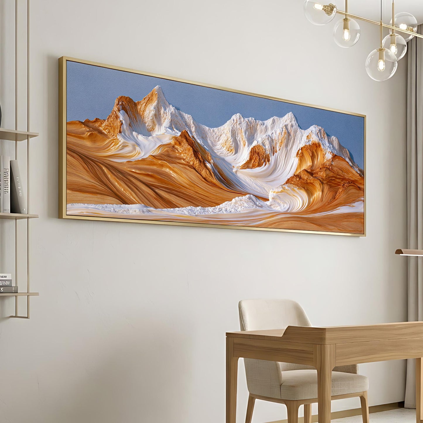 a large, framed painting of a mountain landscape with a wooden desk and chair in the foreground.