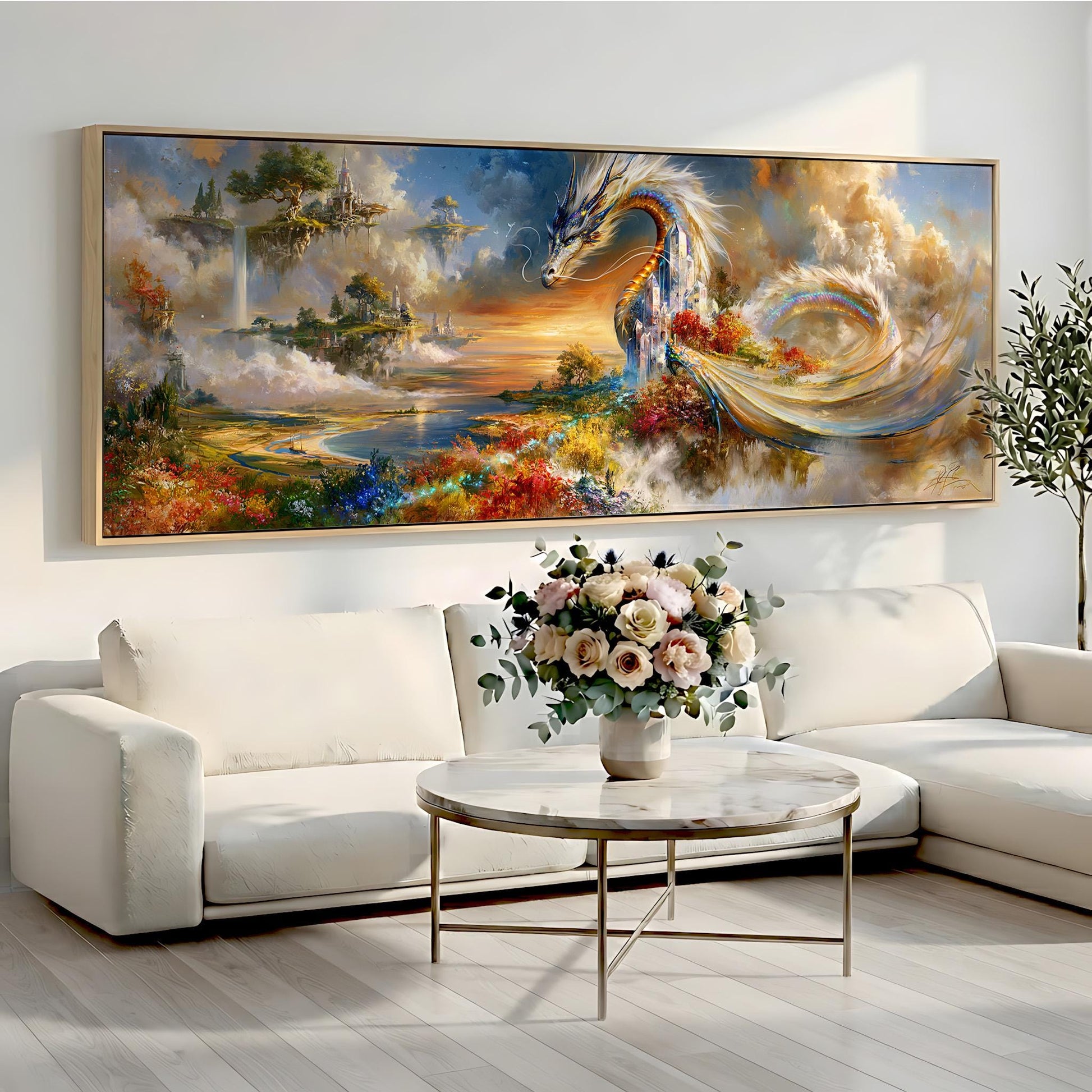 a large, colorful painting of a dragon-like creature with a flowing, rainbow-colored tail, set against a landscape with a castle and clouds. The painting is displayed on a wall above a white sofa, and there is a round coffee table in front of the sofa with a vase of flowers on it.