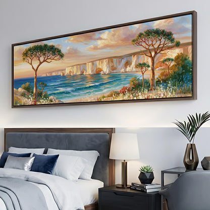 a large painting of a serene landscape with a cliff overlooking a body of water, surrounded by trees and flowers. The painting is hung on a wall above a bed with a gray headboard.