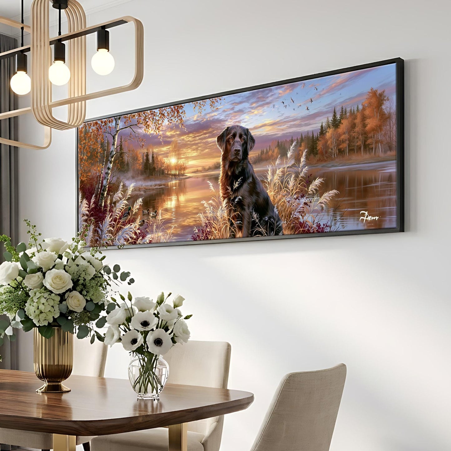 a large framed painting of a dog sitting in a field with a sunset in the background, surrounded by trees and flowers.