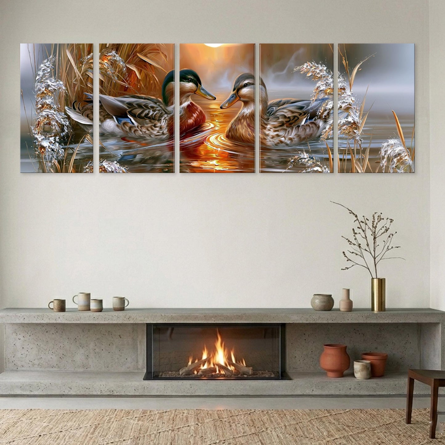 A cozy living room with a fireplace, a coffee table, and a vase of flowers. Above the fireplace, there is a large painting depicting two ducks swimming in a pond, with a warm, golden sunset in the background.