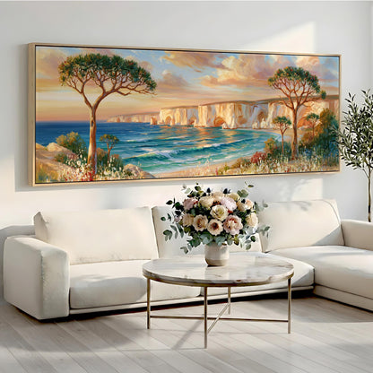 a large painting of a serene coastal landscape with a tree, a vase of flowers, and a calm ocean in the background. The painting is hung on a wall above a white sofa and a round coffee table.