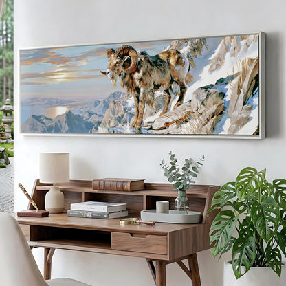 a large painting of a ram on a mountain, hanging on a wall above a wooden desk with various items on it.