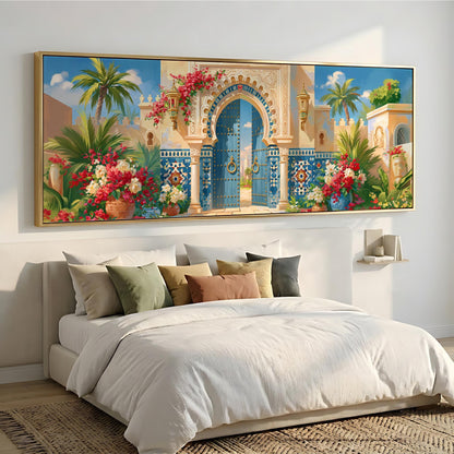a large, colorful painting of an ornate gate and lush tropical foliage hanging above a bed with white bedding and pillows.