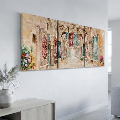 a hallway with a series of colorful rugs hanging from the ceiling, creating a visually striking and vibrant scene.