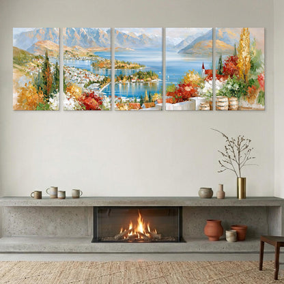a cozy living room with a fireplace, a large wall art depicting a scenic landscape, and various decorative items on a shelf below the fireplace.