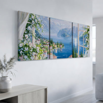 a large, three-panel painting depicting a picturesque coastal town with a harbor, surrounded by mountains and lush greenery.