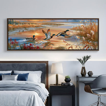 a serene bedroom scene with a large painting of ducks swimming in a pond hanging on the wall above a bed with a gray headboard.