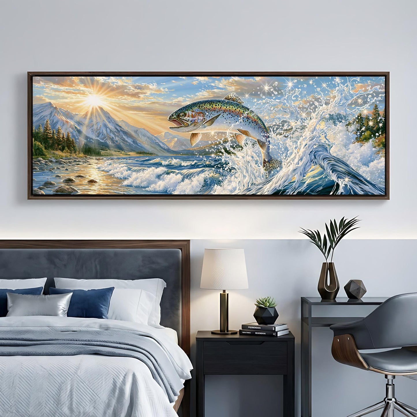 a large, framed painting of a fish leaping out of the water, set against a backdrop of mountains and a sunset. The painting is hung on a wall above a bed with a gray headboard.