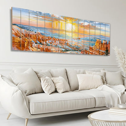 a large, colorful painting of a cityscape with a sunset in the background, hanging on a wall above a white sofa in a living room setting.