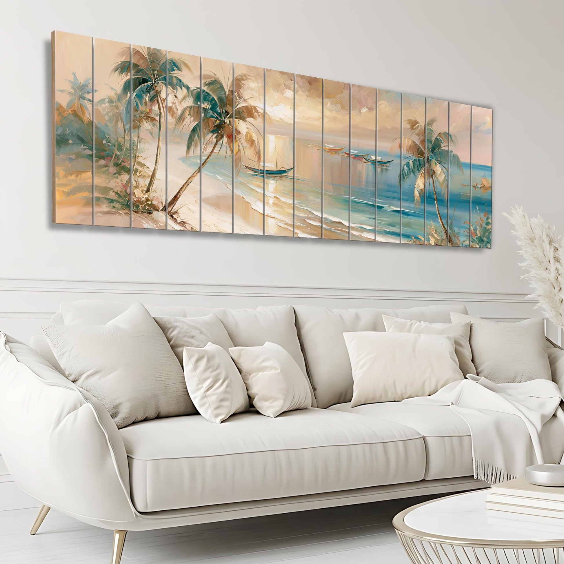 a large, white, two-seater sofa with a cozy throw blanket draped over the armrest. Above the sofa, there is a large, colorful painting depicting a tropical beach scene with palm trees, a boat, and a sunset.