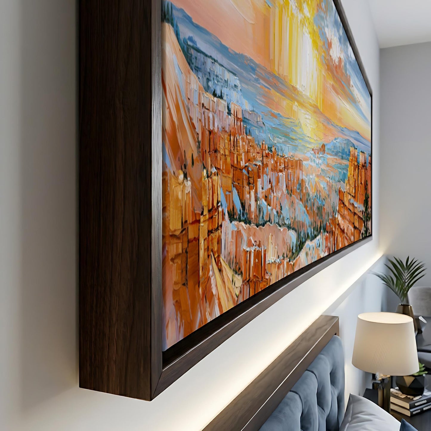 a large, colorful painting of a mountainous landscape, hanging on a wall in a room.