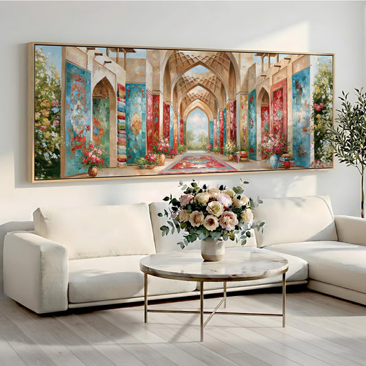 a large, colorful painting of an ornate hallway with arches and columns, hanging on a wall above a white sofa and a round coffee table with a vase of flowers.