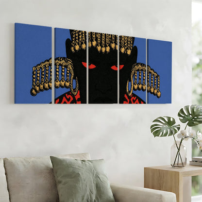 a large, colorful painting of a black figure with gold accents, displayed on a wall above a couch in a living room setting.